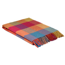 Multi-colour check throw folded up