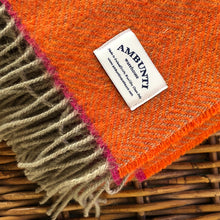Orange wool throw made by Ambunti Warehouse