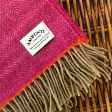 Pink wool throw by Ambunti Warehouse