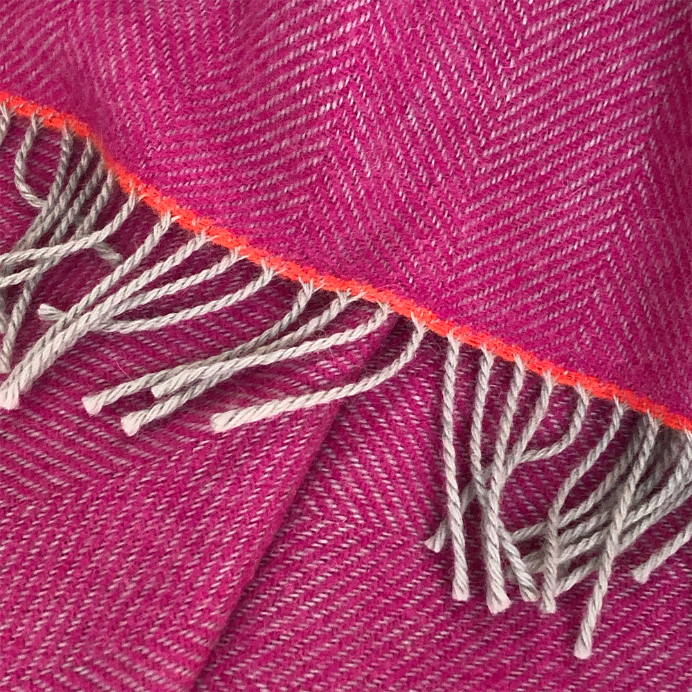 Pink Fuchsia wool throw with orange highlight and grey tassels
