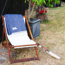 navy herringbone throw on a deck chair