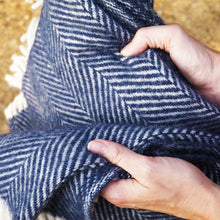 navy blue herringbone wool throw showing soft texture