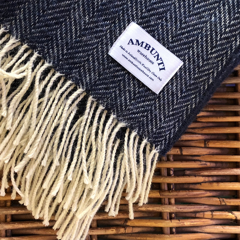 Navy blue herringbone wool interior throw made by Ambunti Warehouse