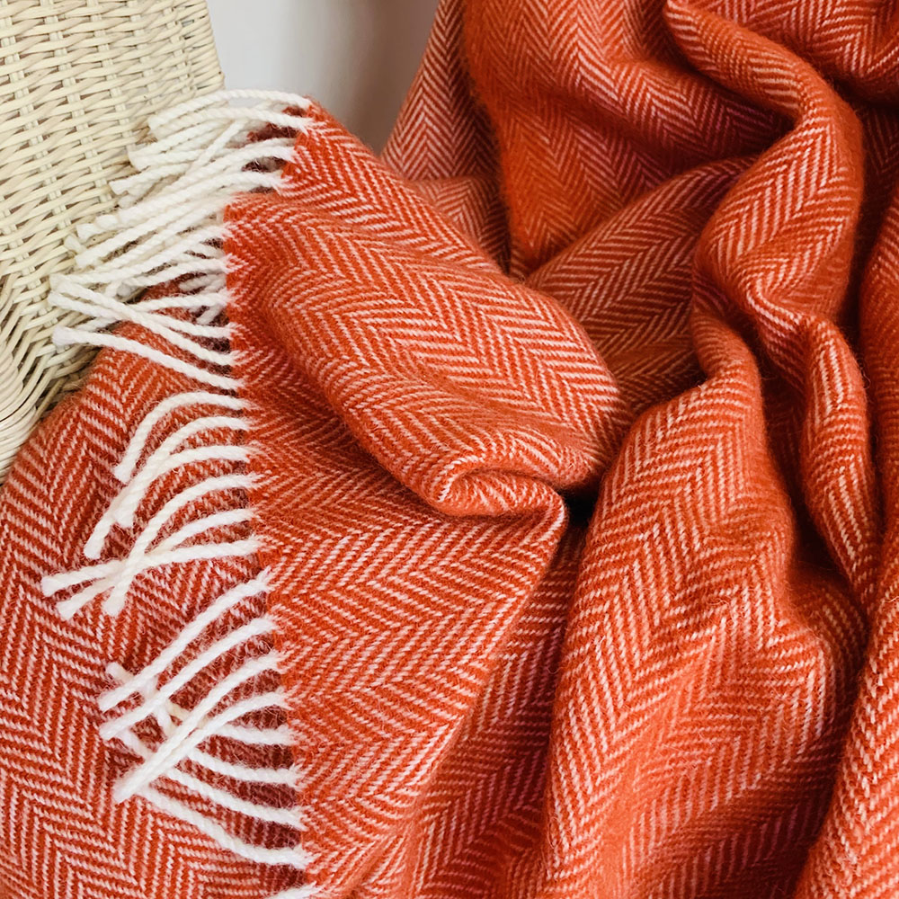 Orange herringbone wool throw