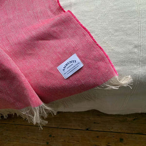 Pink linen throw by Ambunti Warehouse